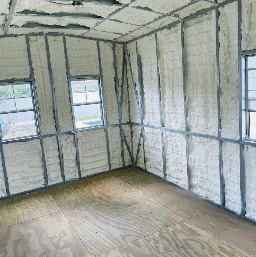 Closed-cell spray foam insulation applied to wall cavities in a residential project in Blackman